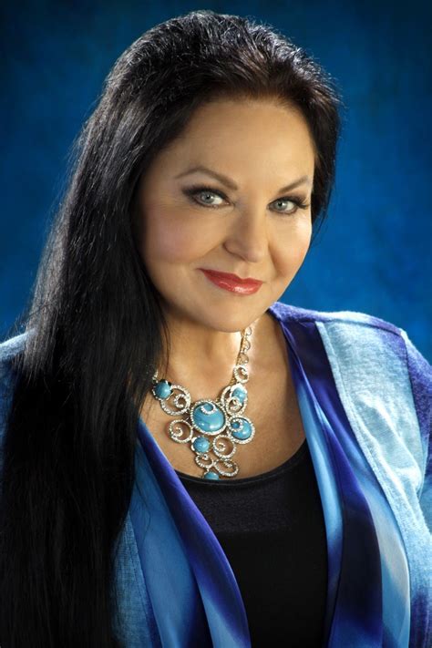 The Evolution of Crystal Gayle's Iconic Hairstyle