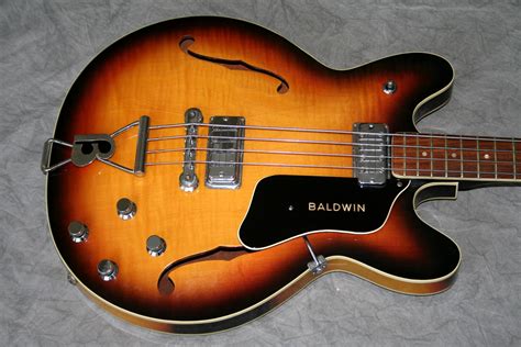 The Impact of John Baldwin's Bass Guitar Style
