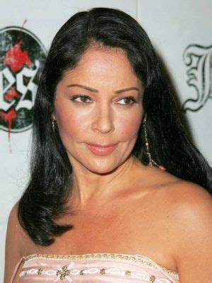 Unveiling Apollonia Kotero: Exploring Her Height, Figure, and Beauty